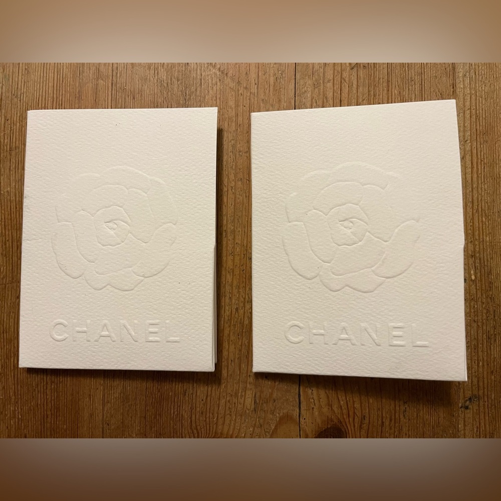 Two CHANEL Receipt Holders